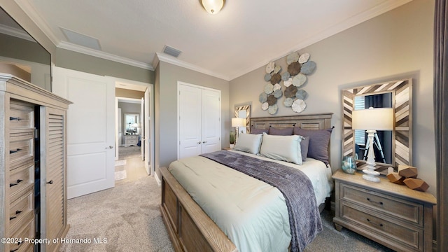 bedroom featuring a closet, light colored carpet, and crown molding