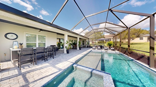 view of pool featuring a patio and a lanai