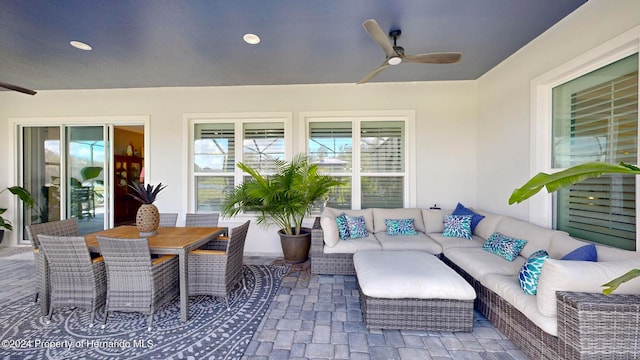 view of patio / terrace featuring an outdoor living space and ceiling fan