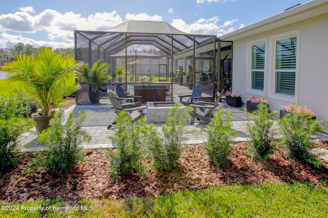 view of patio with a lanai