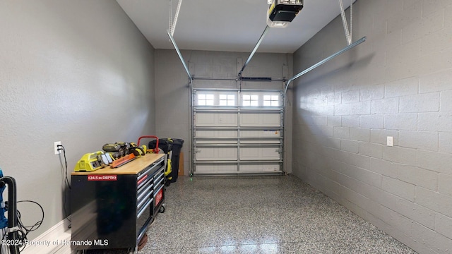 garage featuring a garage door opener