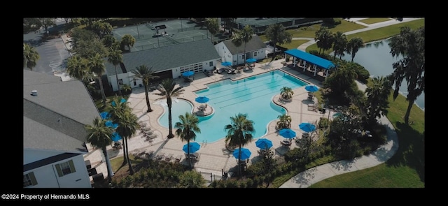 view of swimming pool featuring a patio