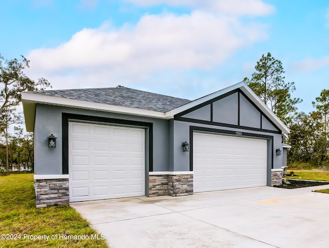 single story home featuring a garage