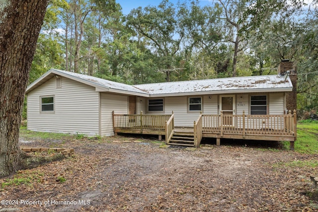 view of front of house featuring a wooden deck