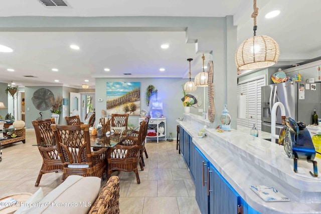 dining space with light tile patterned floors