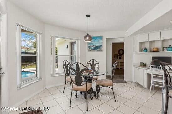 tiled dining area with built in desk