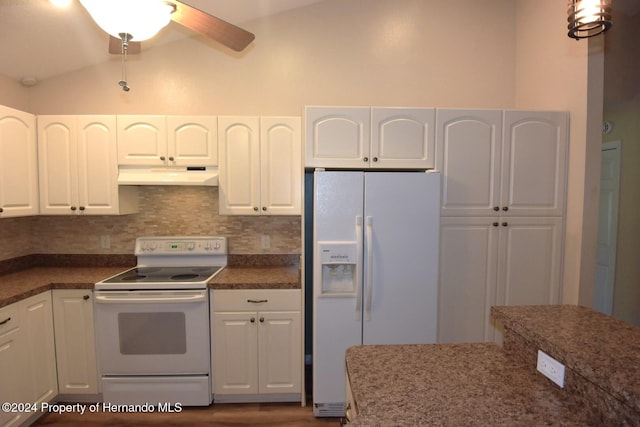 kitchen featuring ceiling fan, tasteful backsplash, vaulted ceiling, white appliances, and white cabinets