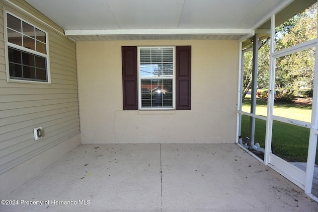 view of unfurnished sunroom