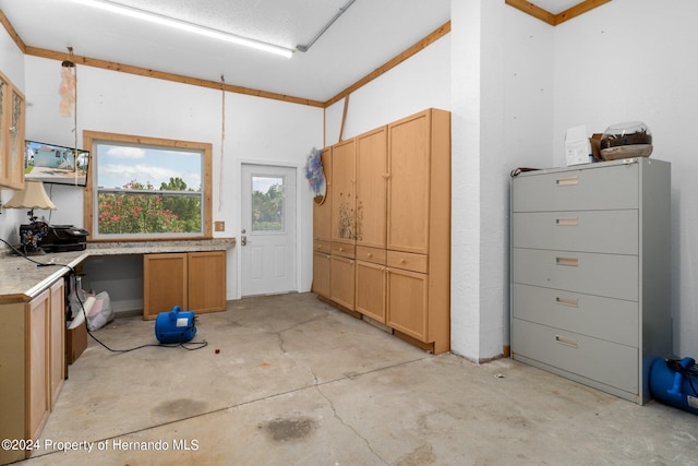 interior space featuring crown molding