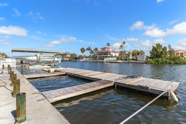 dock area featuring a water view