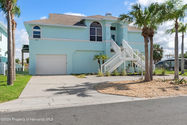 view of front of home with a garage