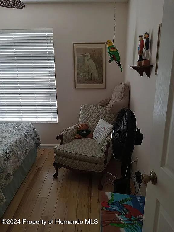 bedroom featuring light hardwood / wood-style floors