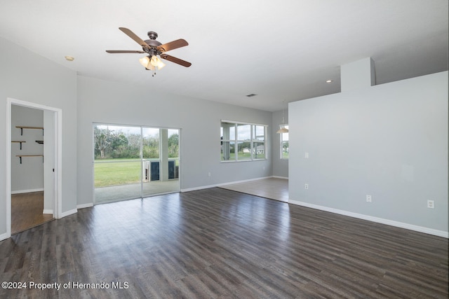 spare room featuring ceiling fan and dark hardwood / wood-style flooring