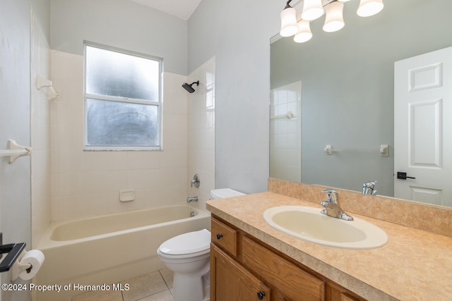 full bathroom with vanity, tile patterned floors, toilet, and tiled shower / bath