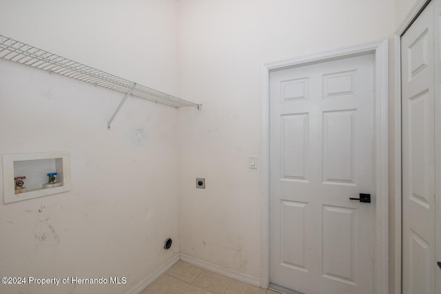 laundry room with washer hookup, light tile patterned flooring, and hookup for an electric dryer