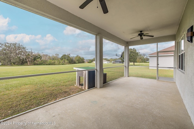 view of patio featuring ceiling fan