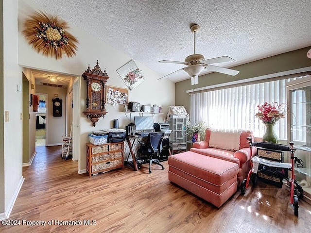 office featuring wood-type flooring, ceiling fan, and a textured ceiling