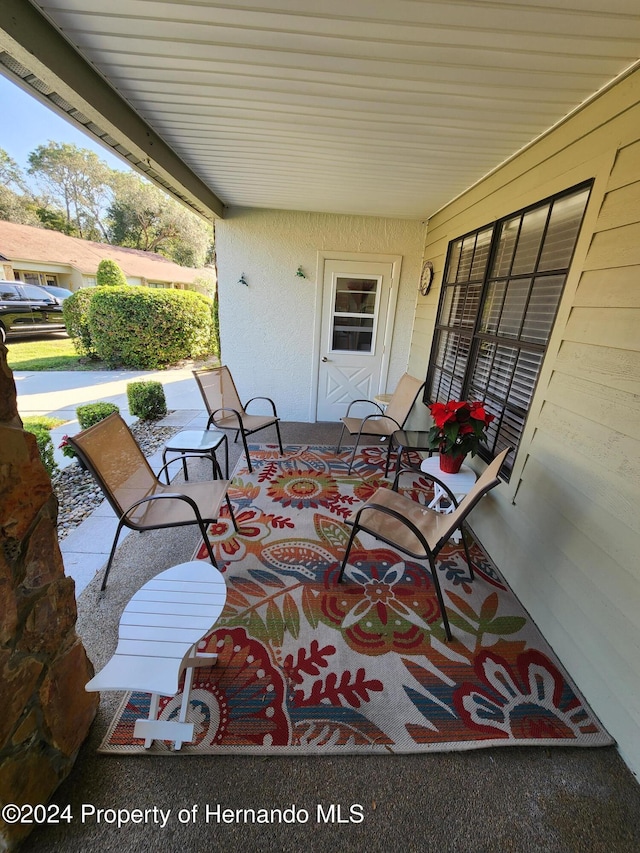 view of patio featuring covered porch