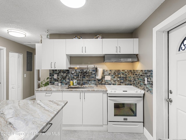 kitchen featuring white cabinetry, sink, extractor fan, white range with electric stovetop, and tasteful backsplash