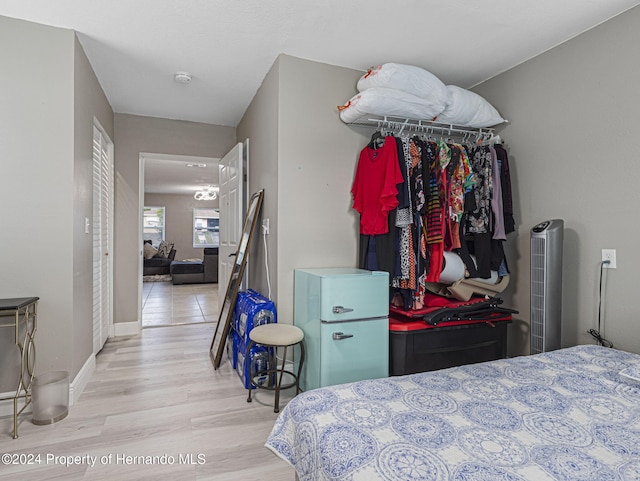 bedroom featuring light wood-type flooring