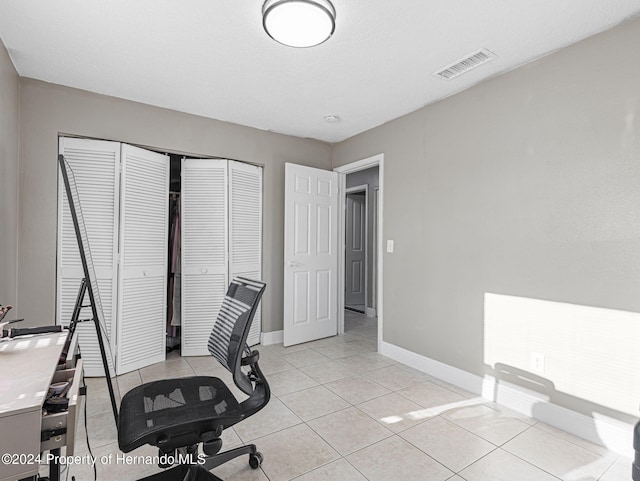 1009 Cobbelstone Dr, Spring Hill, FL 34606 - unfurnished office with light tile patterned floors and baseboards