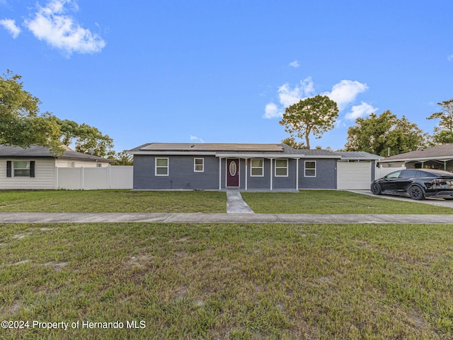 1009 Cobbelstone Dr, Spring Hill, FL 34606 - single story home featuring concrete driveway and a garage