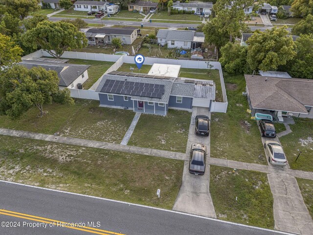 1009 Cobbelstone Dr, Spring Hill, FL 34606 - aerial perspective of suburban area