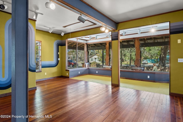 workout room with hardwood / wood-style flooring