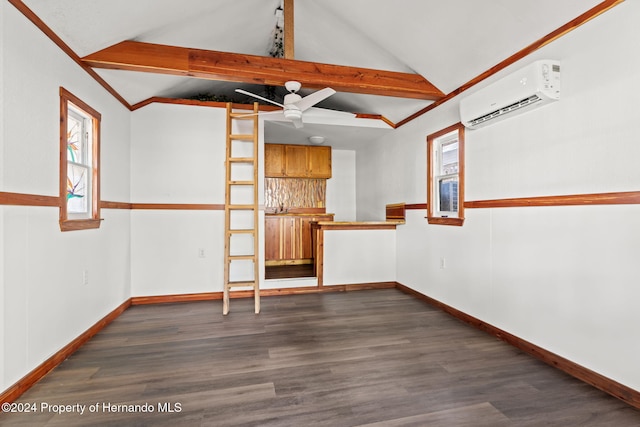 spare room with a wall mounted air conditioner, vaulted ceiling with beams, ceiling fan, and dark hardwood / wood-style flooring