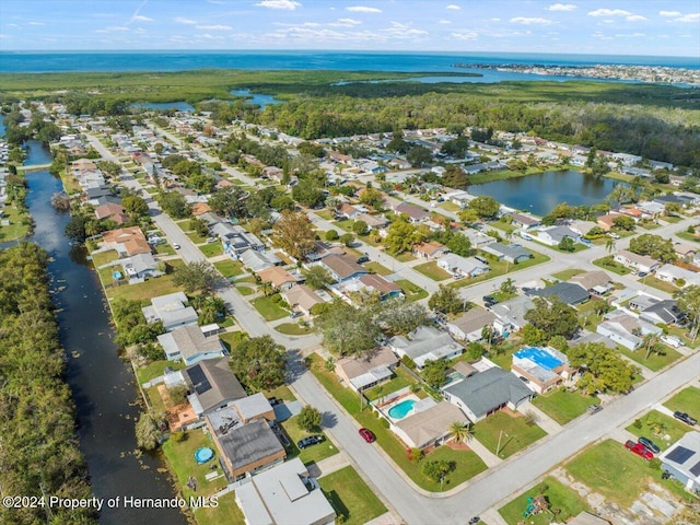 drone / aerial view featuring a water view