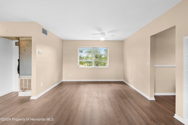 unfurnished room with hardwood / wood-style flooring and ceiling fan