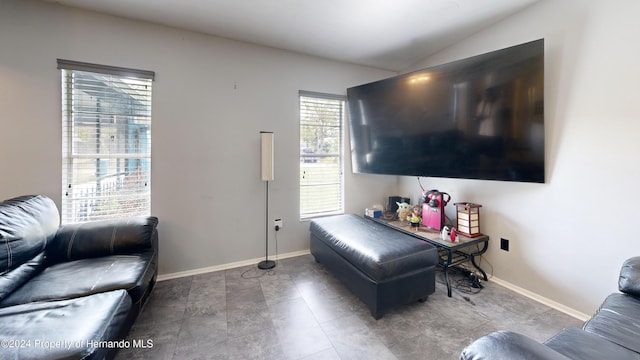 living room with lofted ceiling