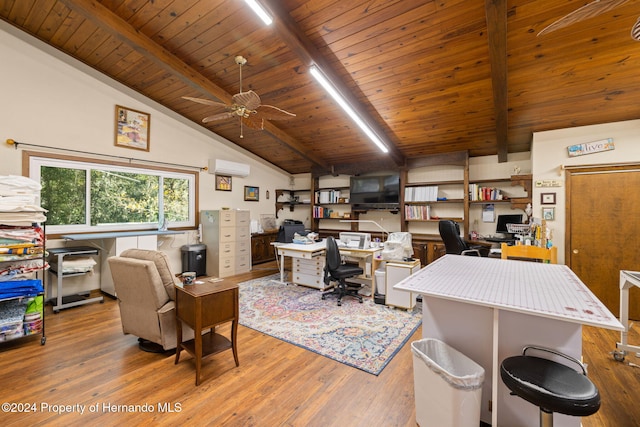 office space with ceiling fan, lofted ceiling with beams, hardwood / wood-style flooring, an AC wall unit, and wooden ceiling