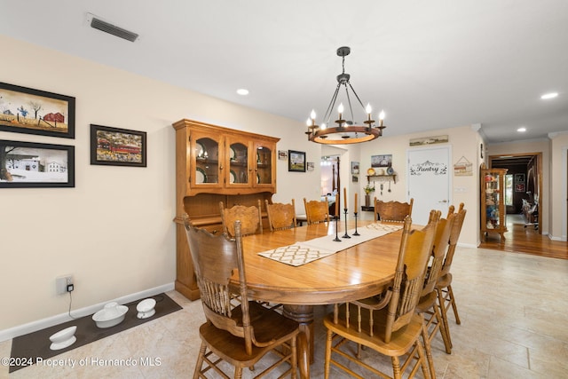 dining room with a chandelier