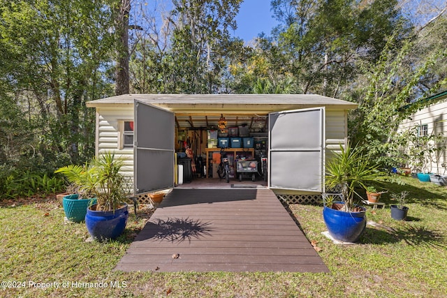 view of outdoor structure with a yard