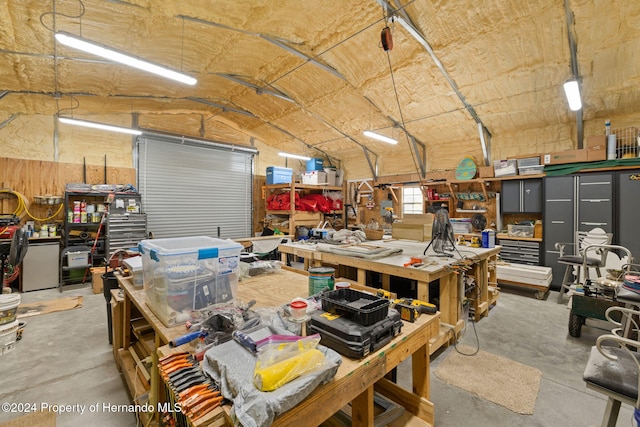 garage with a workshop area