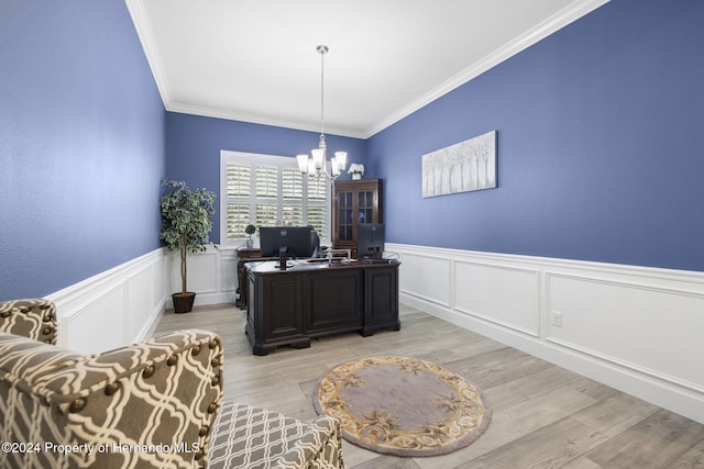 home office with light hardwood / wood-style floors, ornamental molding, and a chandelier