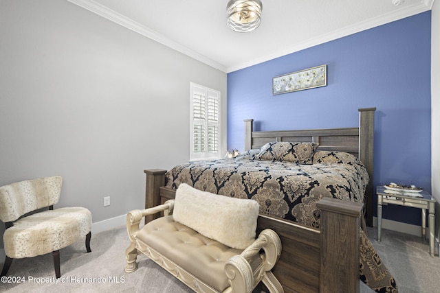 bedroom featuring carpet floors and ornamental molding