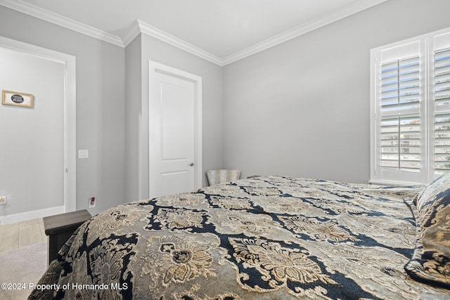 bedroom featuring ornamental molding