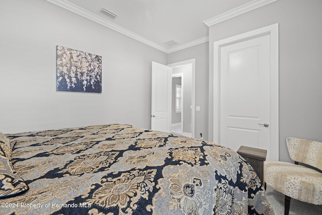 bedroom featuring ornamental molding