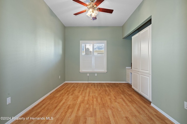 unfurnished room with ceiling fan and light hardwood / wood-style floors