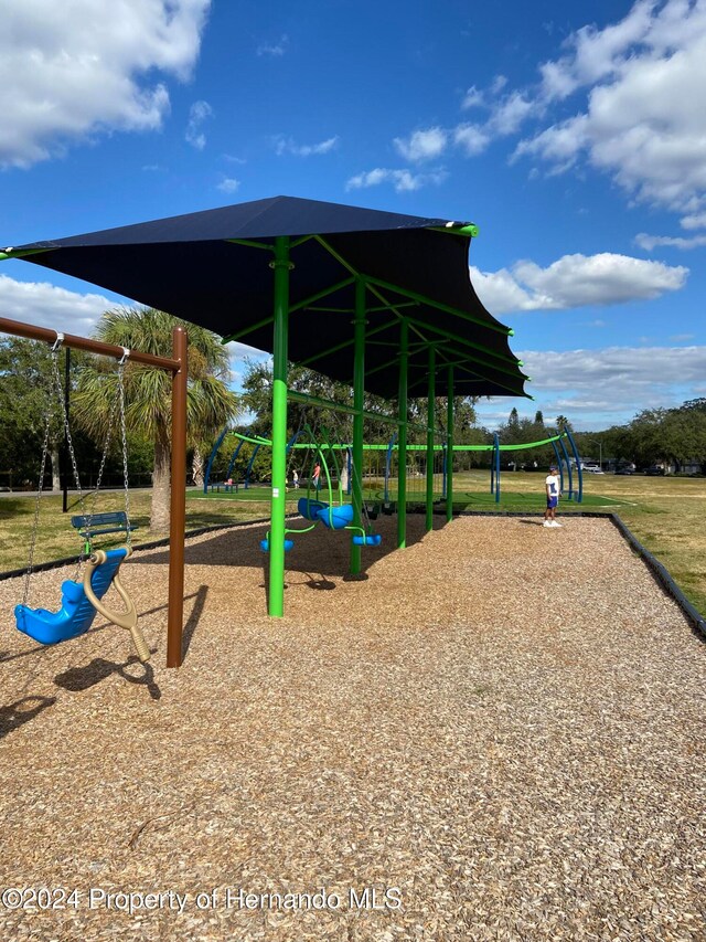 view of community featuring a playground