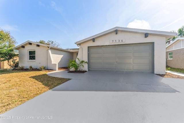 single story home with a garage