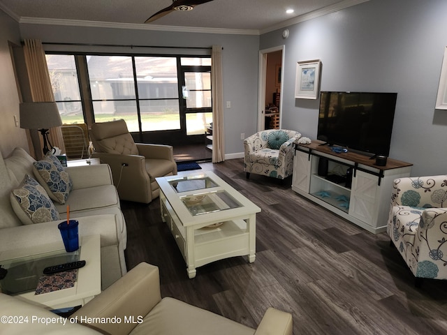 living room featuring dark hardwood / wood-style flooring and ornamental molding