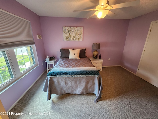 bedroom with carpet flooring and ceiling fan