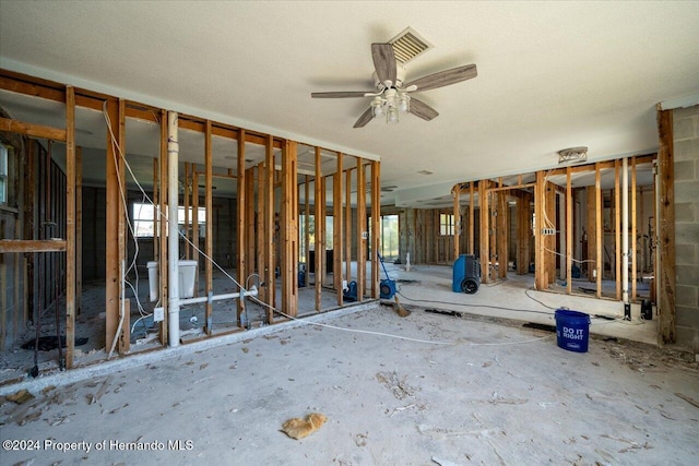 miscellaneous room featuring a wealth of natural light and ceiling fan