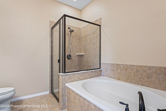 bathroom with plus walk in shower, tile patterned floors, and toilet