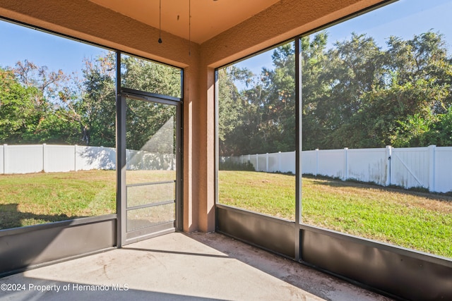 unfurnished sunroom with a healthy amount of sunlight