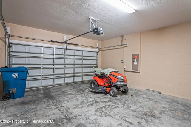 garage featuring electric panel and a garage door opener