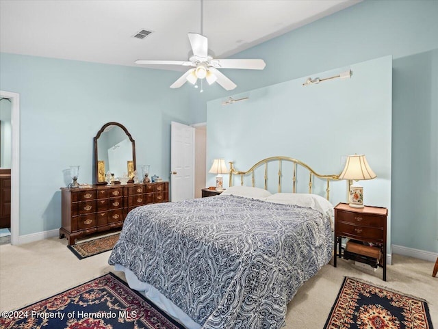 bedroom with ceiling fan and light colored carpet